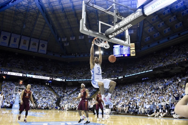 Roy Williams' teams have always thrived behind dominant post players, as they did with Kennedy Meeks (3) last season. | Photo by Turner Walston
