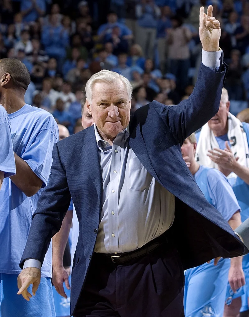 Dean Smith received a roaring applause as he stood on the Smith Center court in 2010. But had he known he'd be in the spotlight, he likely wouldn't have come at all. | Photo courtesy UNC Athletic Communications