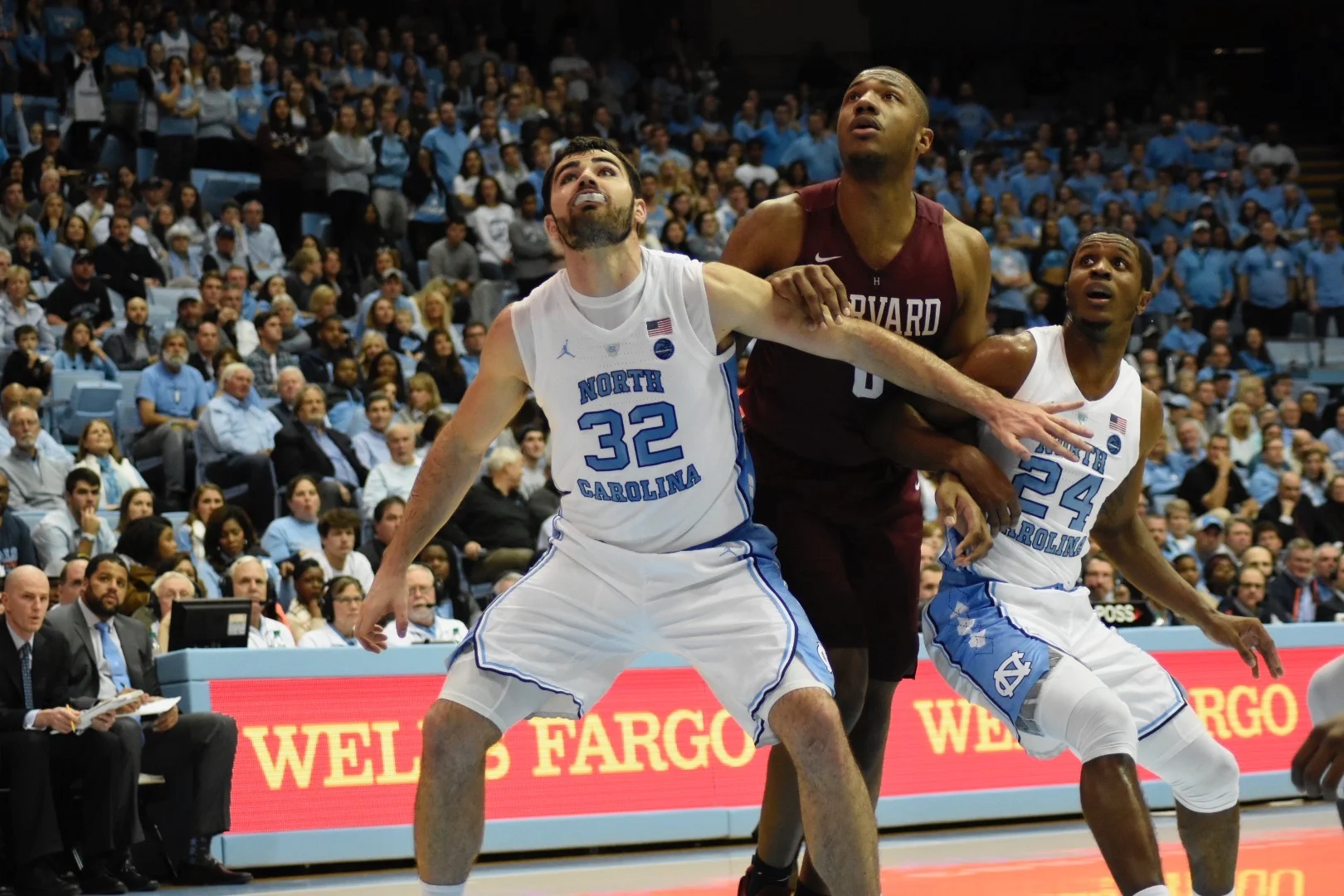 Luke Maye (32) boxes out on a free throw attempt in Wednesday’s win against Harvard. The senior forward leads the Tar Heels with 9.8 rebounds a game as of publishing. | Photo by Turner Walston