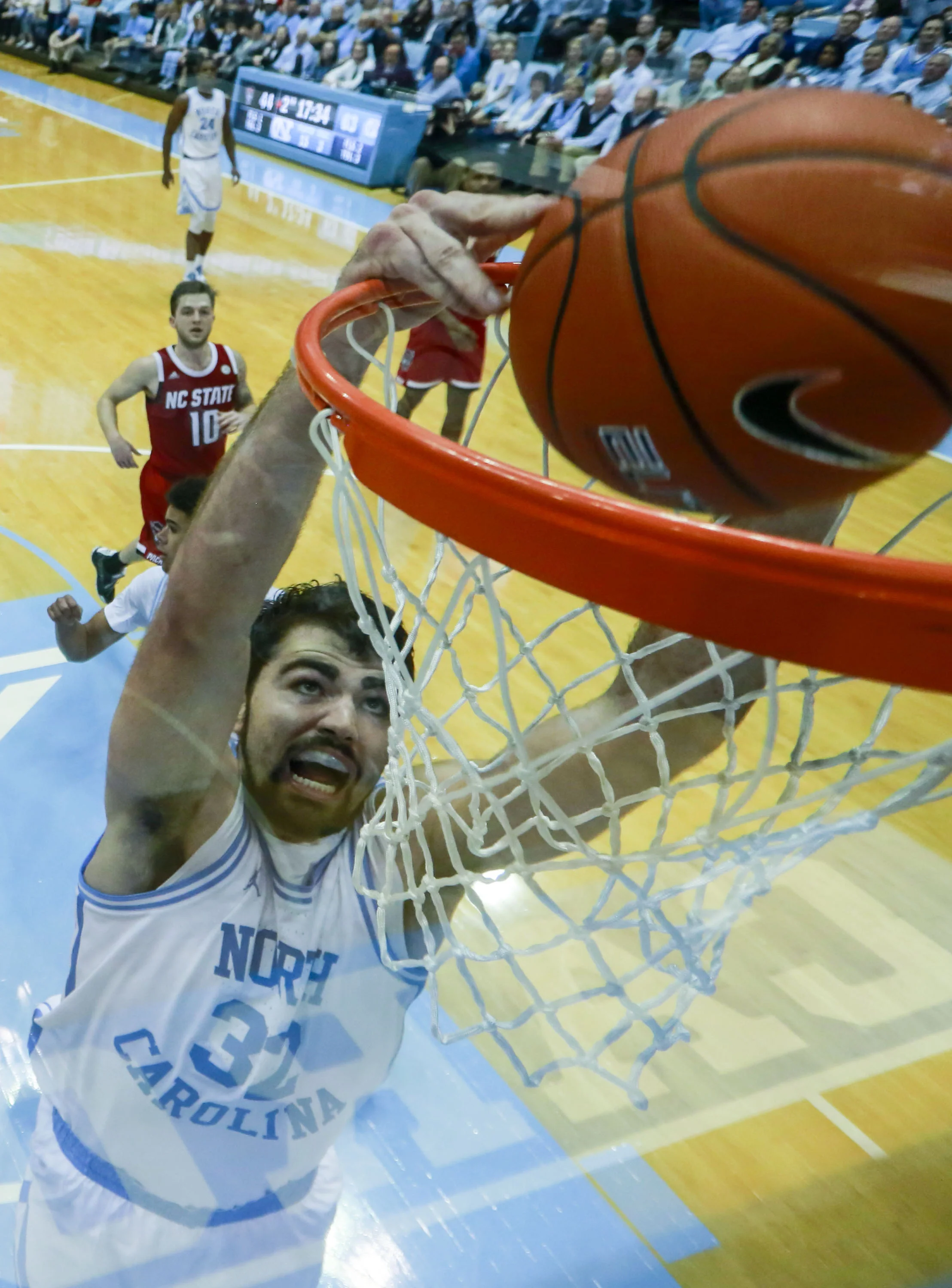 Noted Wolfpack killer Luke Maye dunks home two of his 31 points against N.C. State. The senior forward has averaged 29.0 points and 13.0 rebounds against the Wolfpack the last two years. | Photo by Alex Kormann