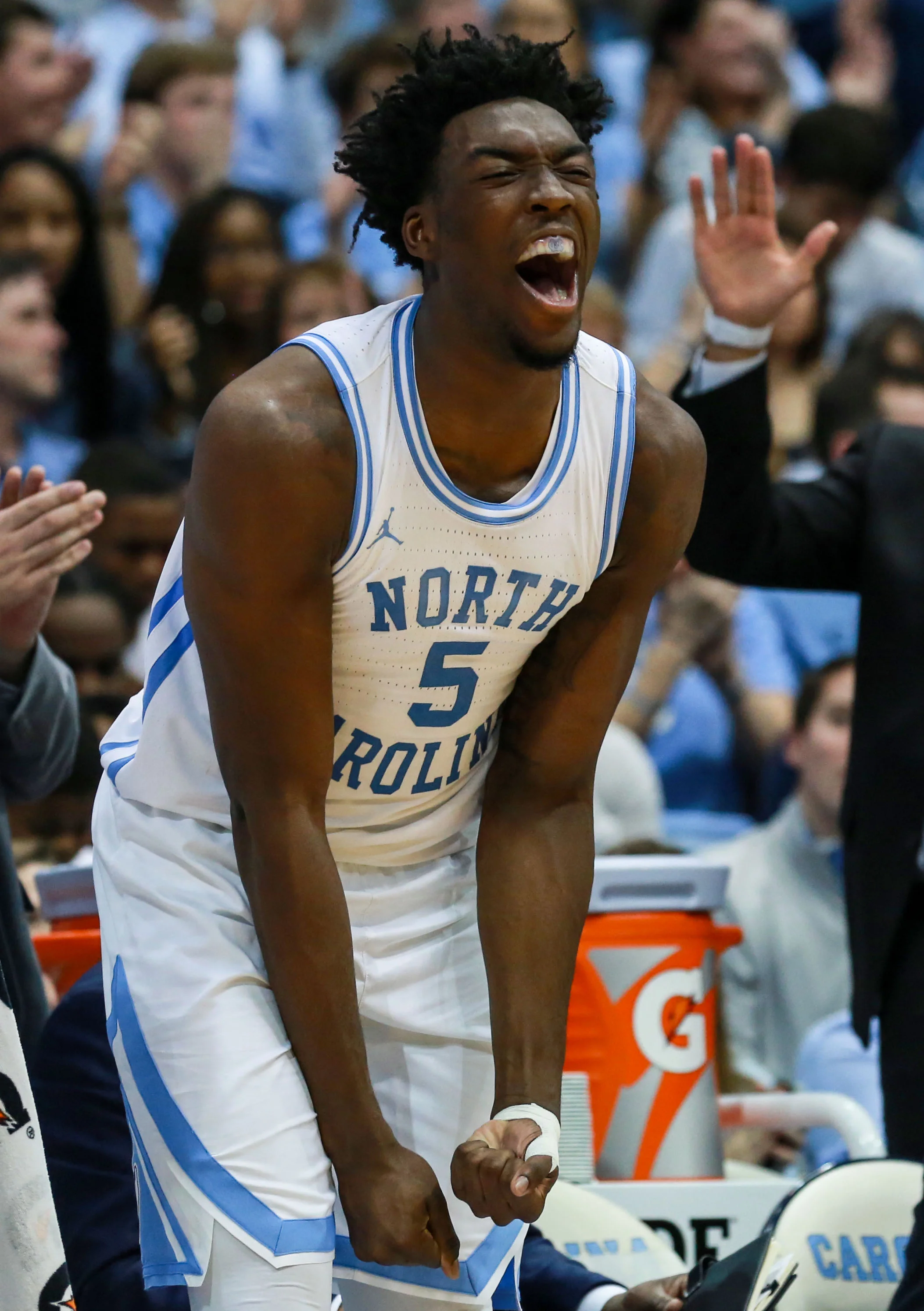 Nassir Little celebrates from the UNC bench on Tuesday night. Little scored 12 points and grabbed six rebounds in the win. | Photo by Alex Kormann