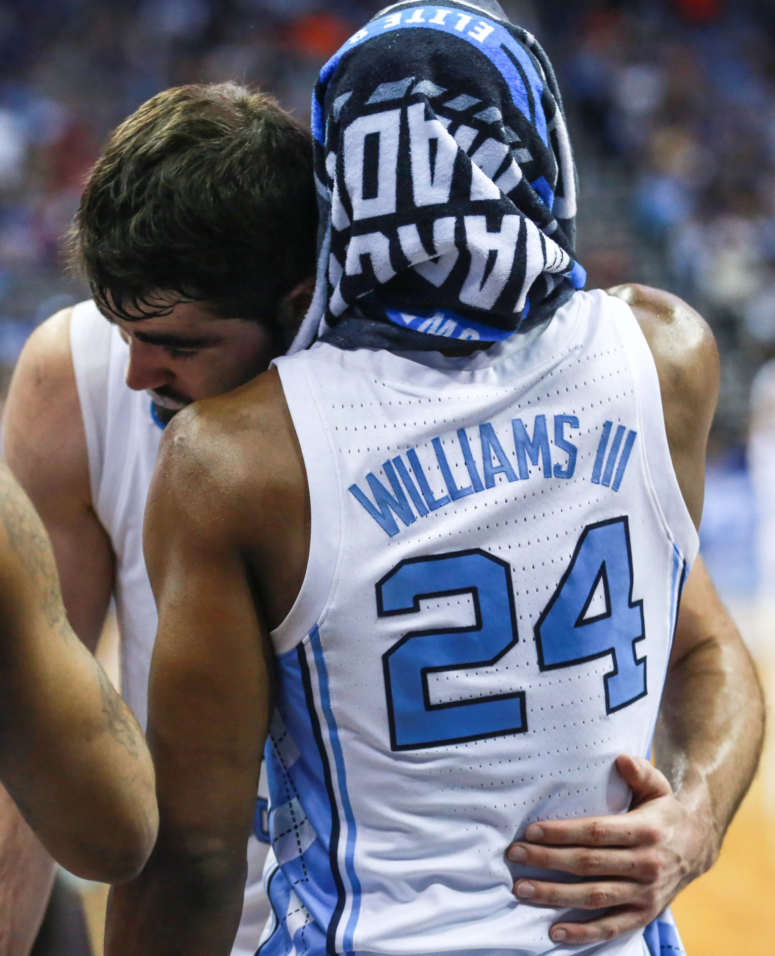 Kenny Williams and Luke Maye embrace after Maye checks out for the final time as a Tar Heel. | Photo by Alex Kormann