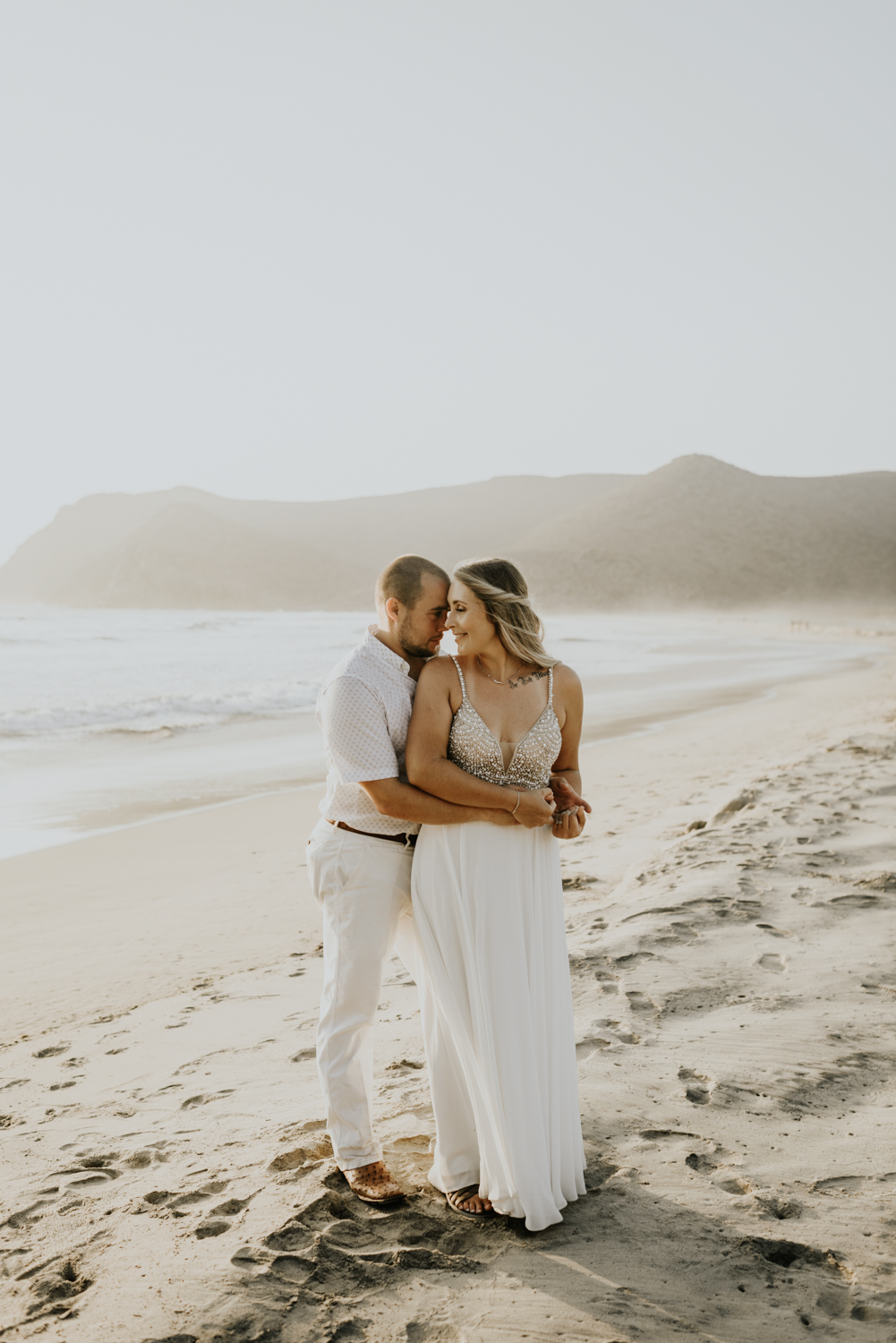 Couple at the beach after their Baja California Elopement