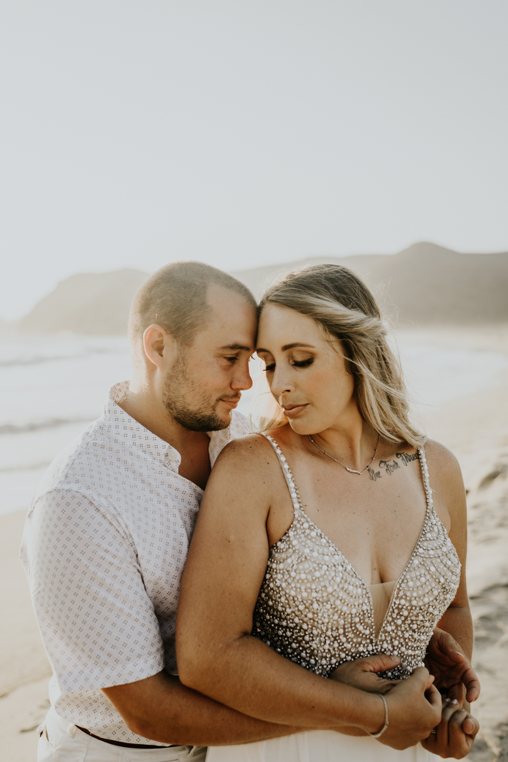 Couple at the beach in Todos Santos after their Baja California Elopement