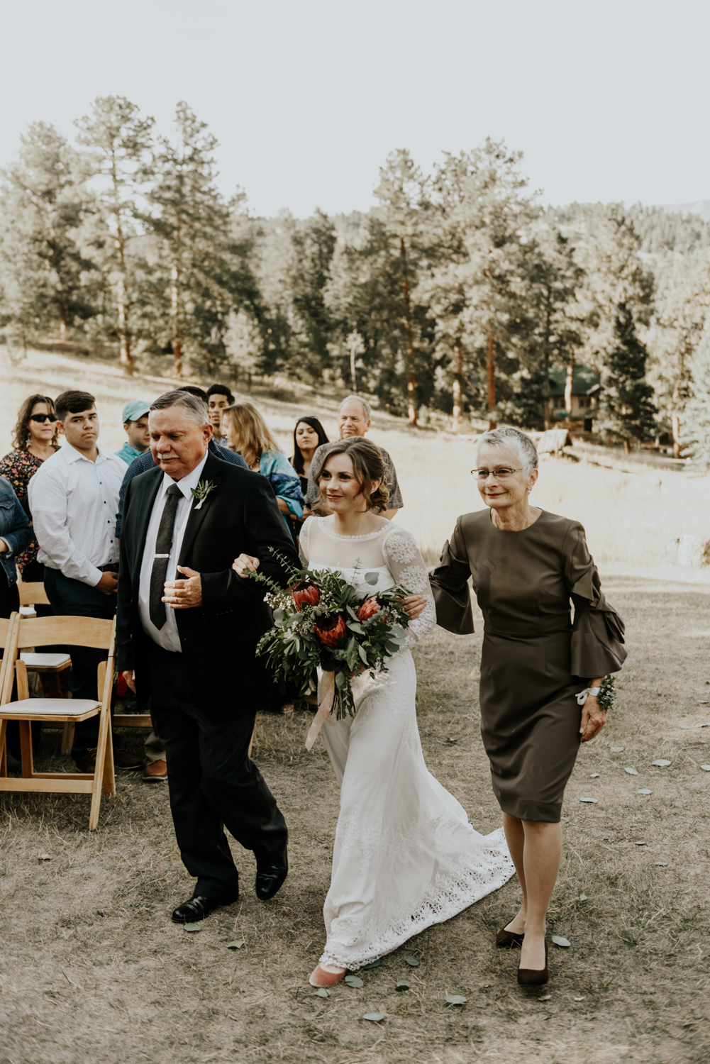 Intimate Mountain Wedding Bride Walking down the aisle Photos in Meadow Creek, Pine Colorado