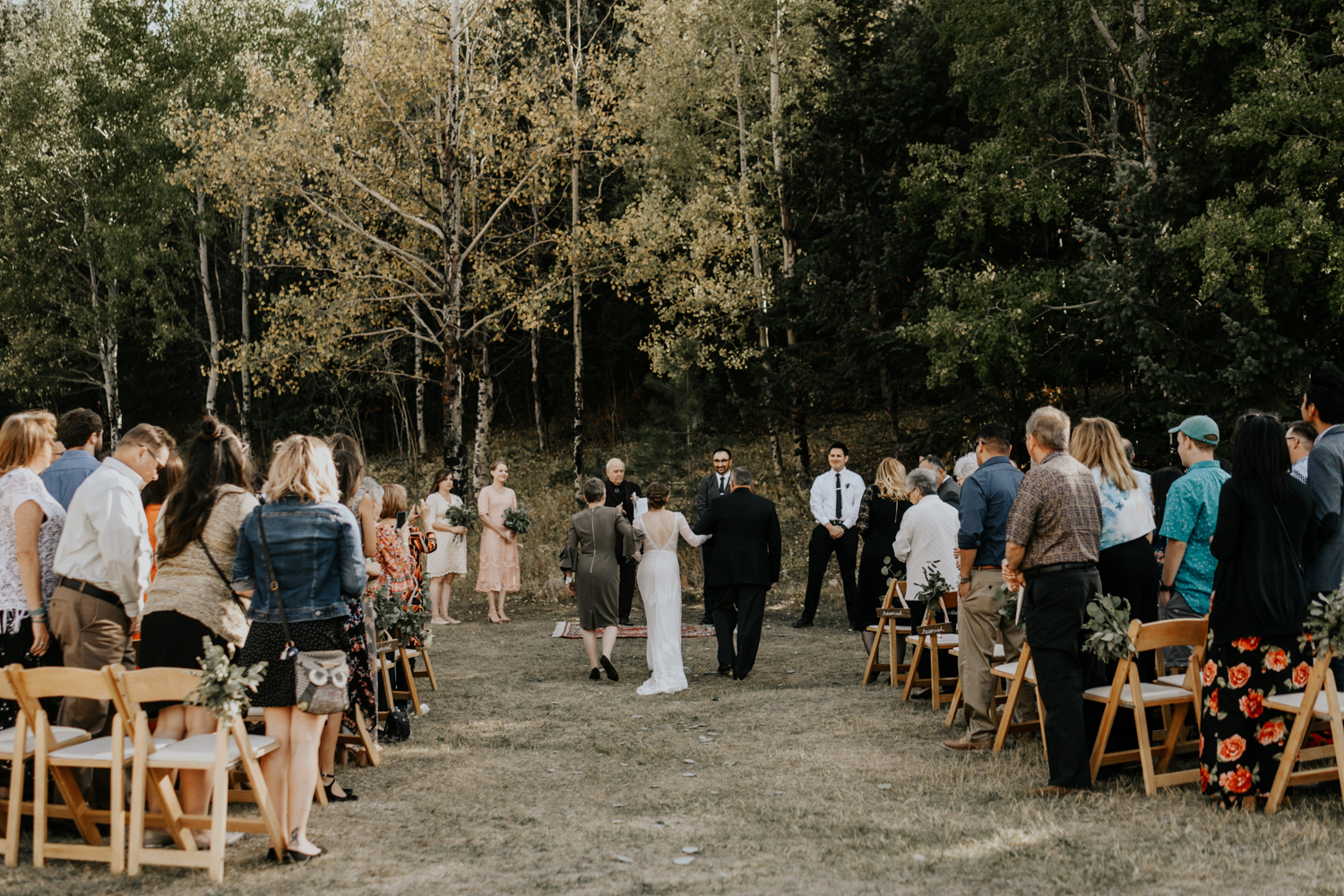 Intimate Mountain Wedding Bride Walking down the aisle Photos in Meadow Creek, Pine Colorado