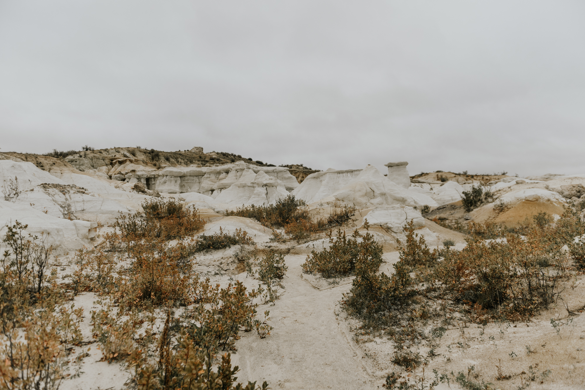 Adventurous Engagement Session at the Paint Mines in Colorado