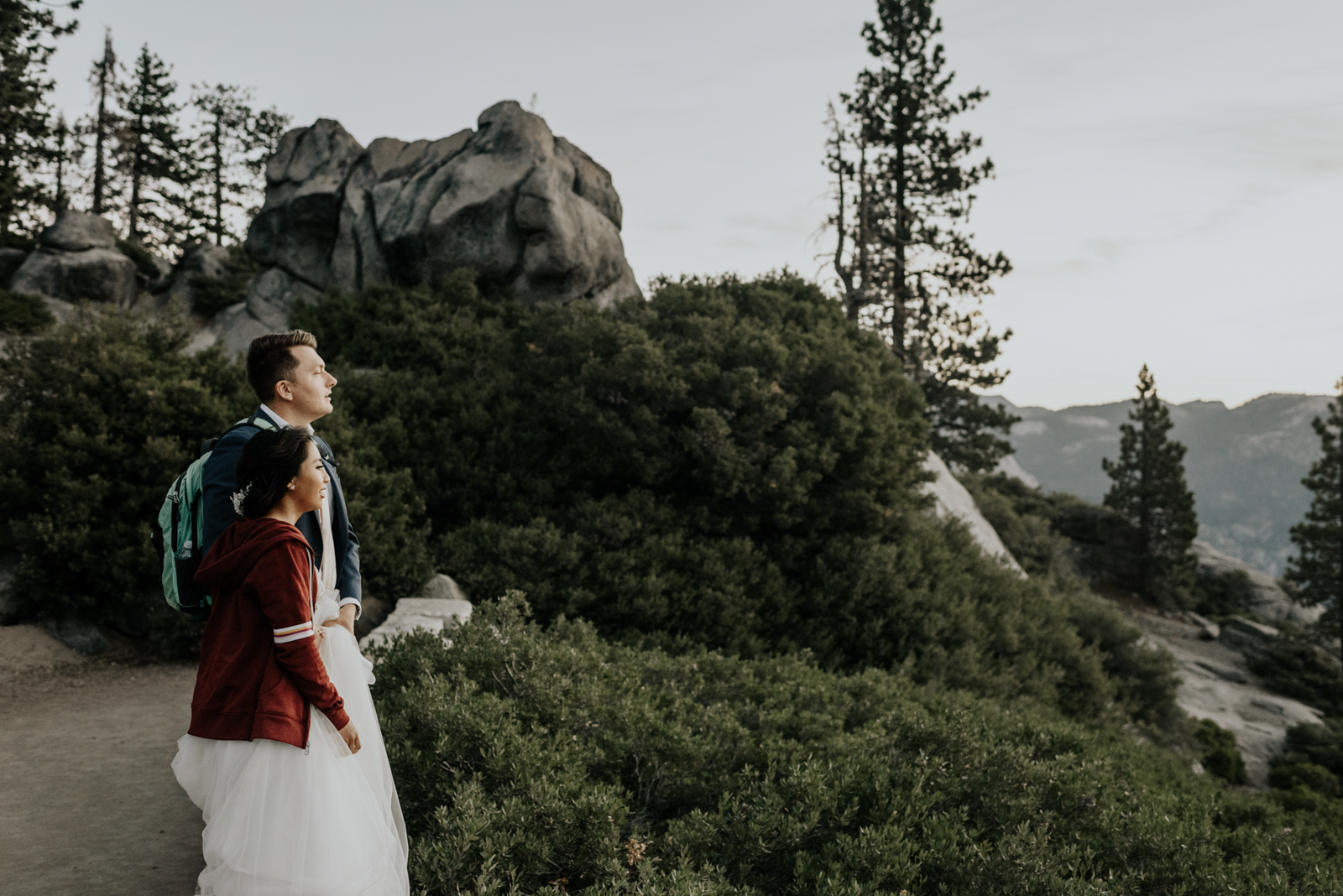 Bride and Groom looking at Half Dome Elopement in Yosemite National Park