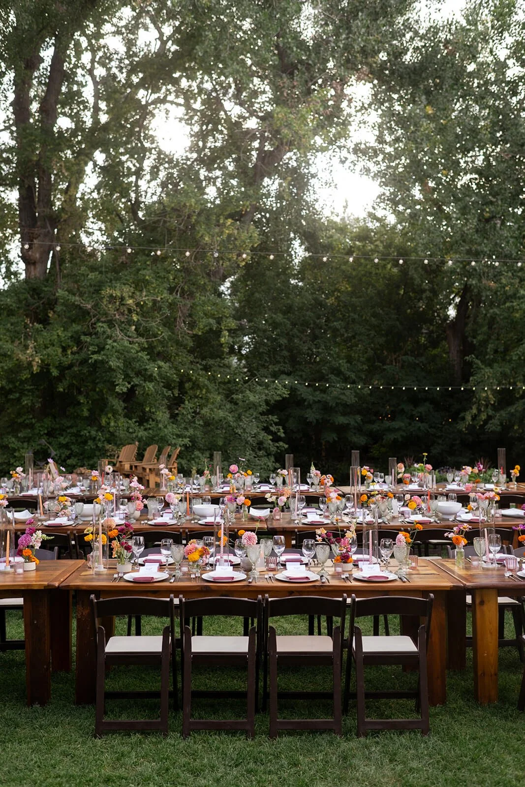 String lights hanging above outdoor tables