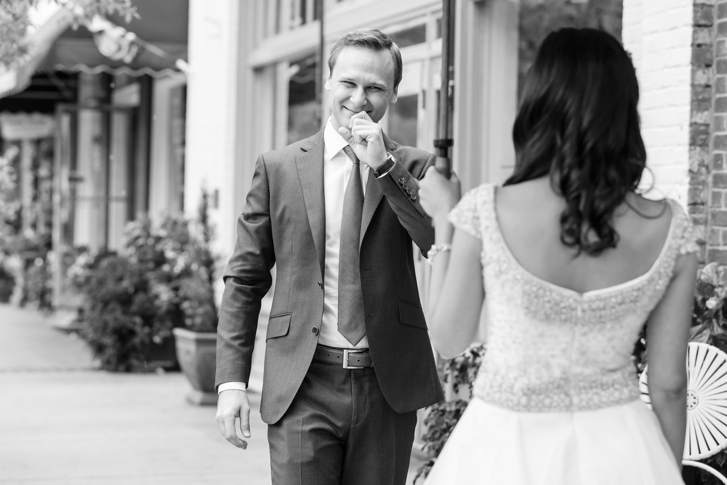 The rain couldn't dampen this groom's excitement at seeing his bride for the first time on his wedding day!