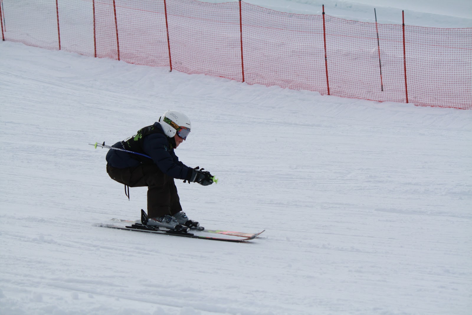 We are lucky to have enough snow to ski, but barely! Grant is on the ski club J6 ski team. His first race was at Snow King resort (3 blocks away!) on the 31st of December.