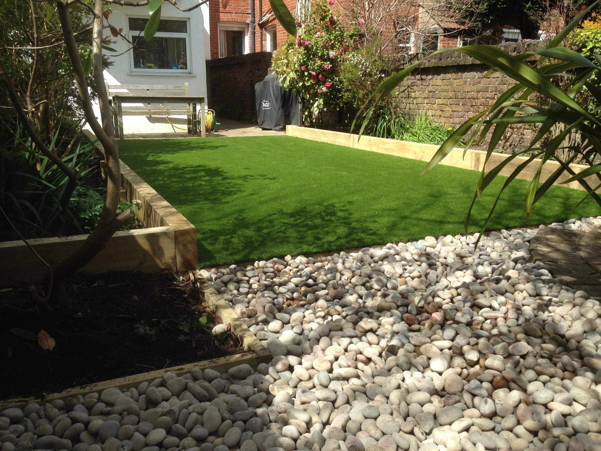 Artificial lawn and sleeper beds, Hove