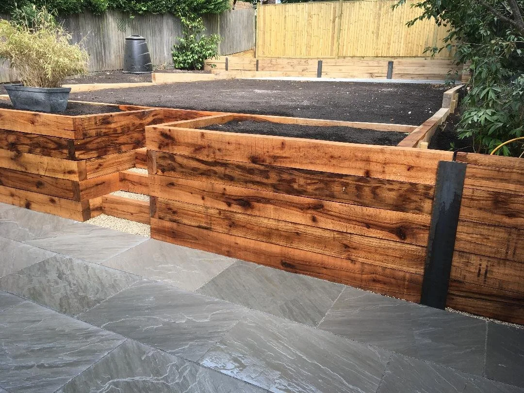 Sleeper retaining walls and paving, Saltdean