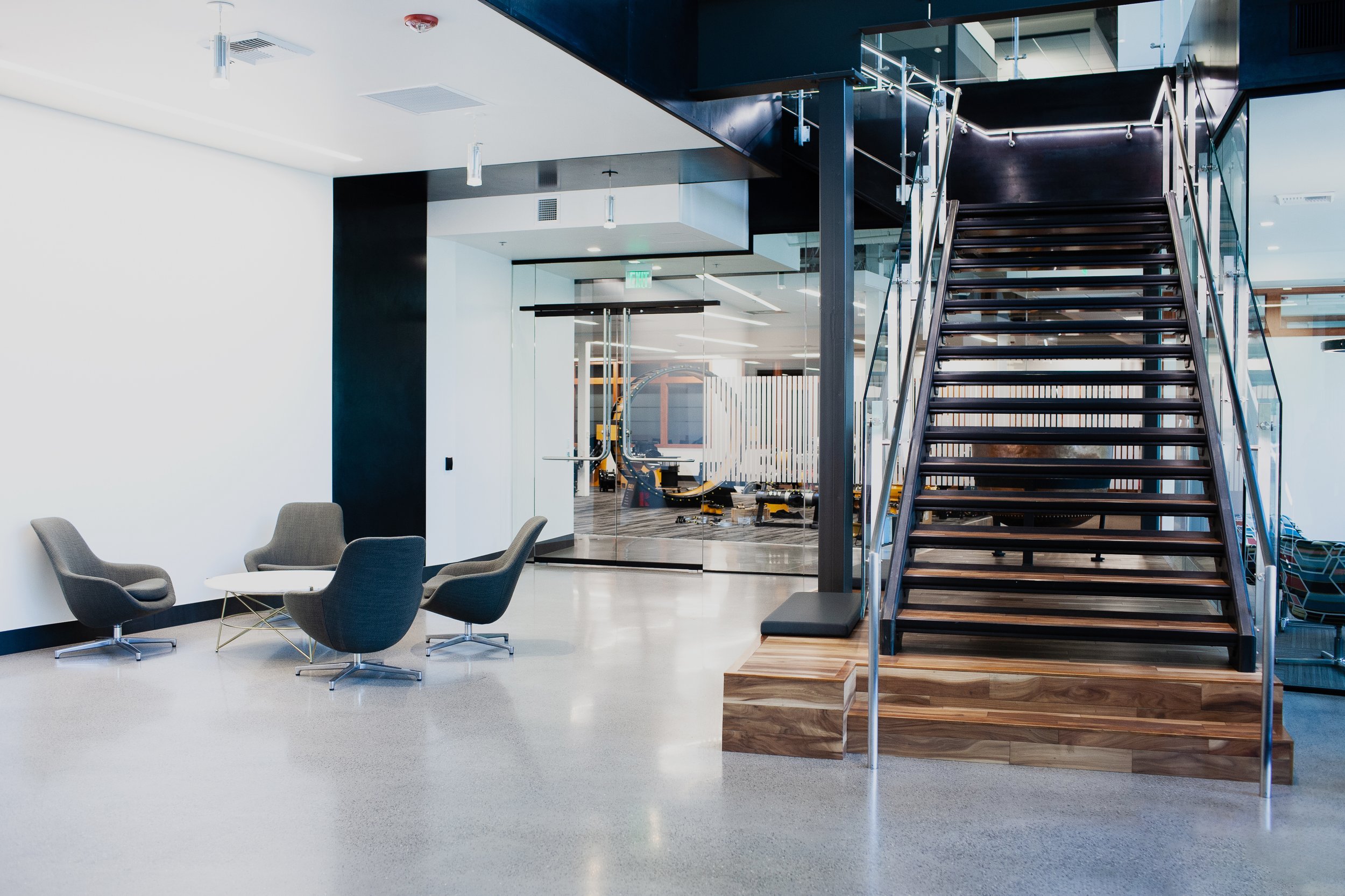 romac-industries-inc-home-office-main-entry-showroom-stairs.jpg