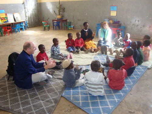 Alex and Ginny Evans share songs with the children at the Center for Orphans and Vulnerable Children