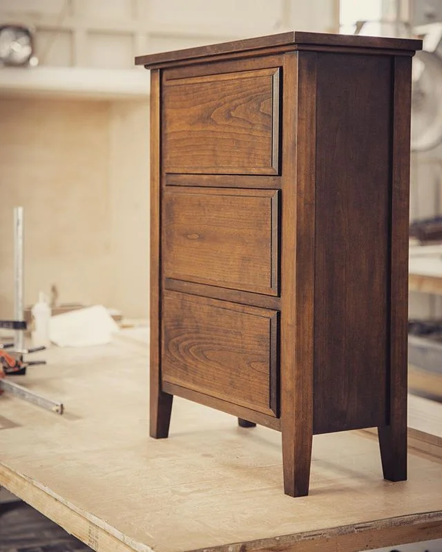 Beautiful cherry night stand. 
#stain #finishing #perfect #wood #woodworking #thecraftsmangroup #amazing #beautiful #woodwork #craftmenship #grain #drawers #legs #sleek #livingroom #decor #shop #woodshop #woodshops #alabamacraftsmenship #craftsman #d