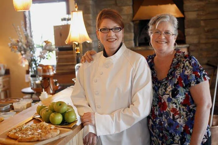 Susan and our very first chef, Laurie