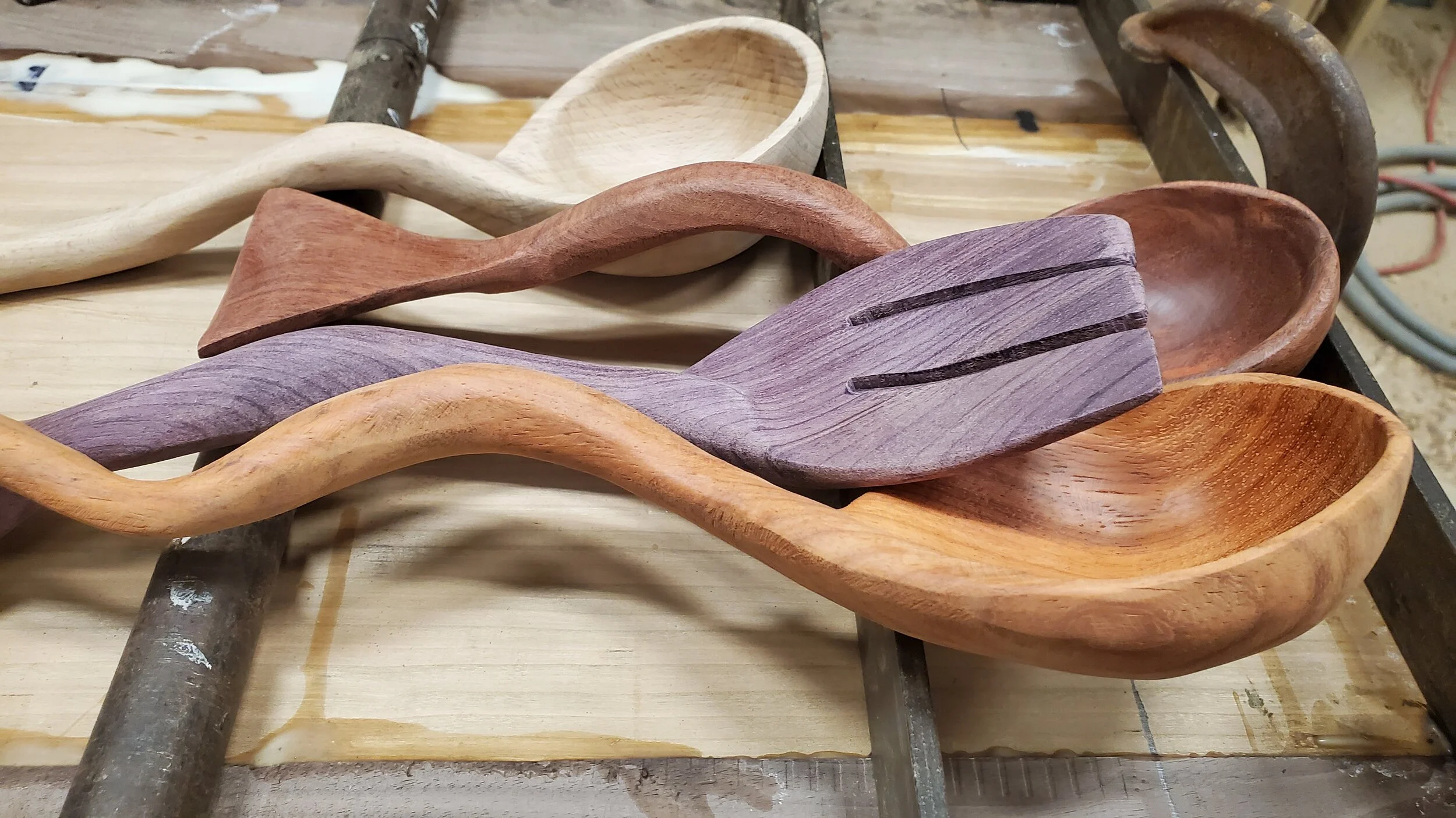 hardwood hand made spoons of various stock and shape