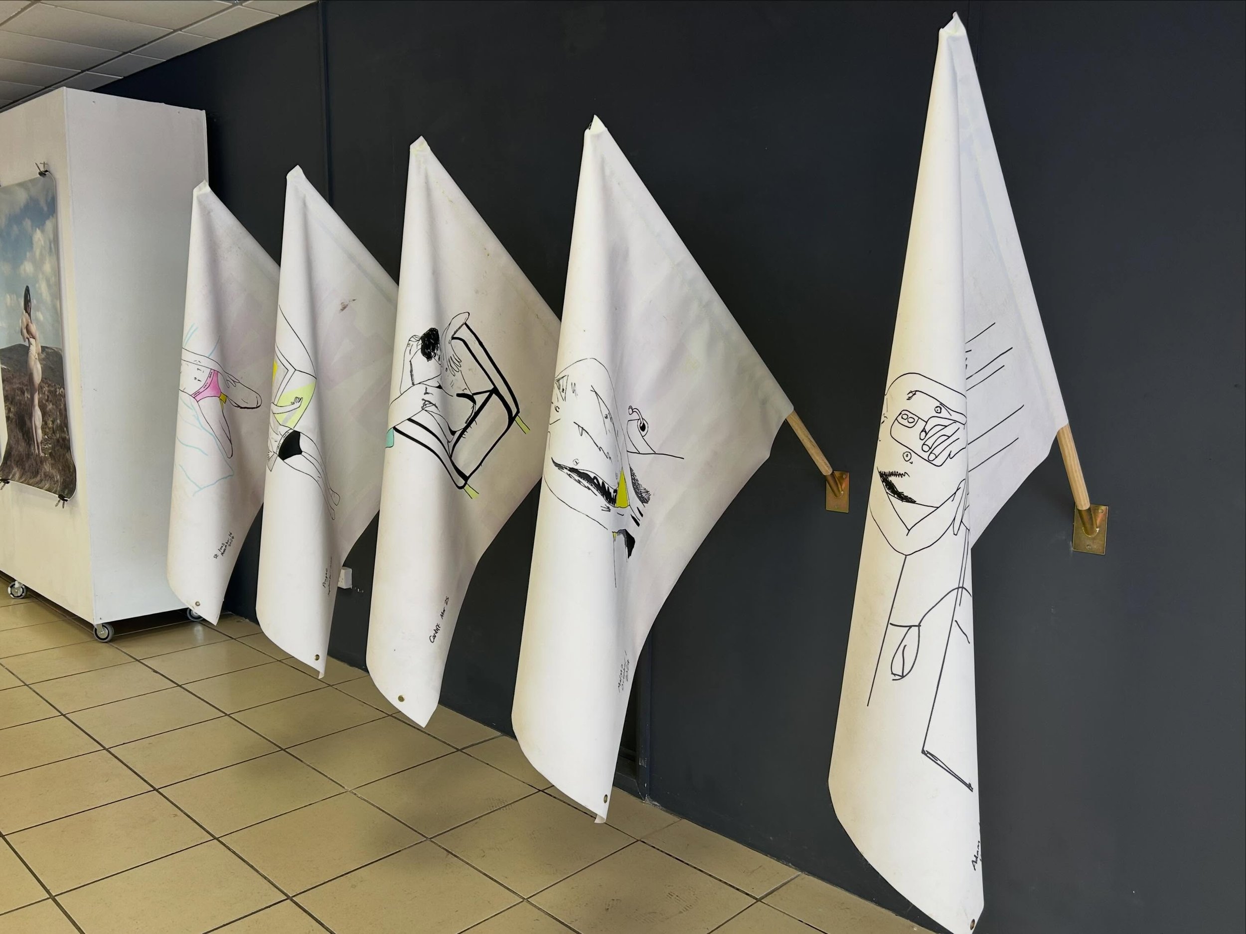 Bodies Borders Becoming 

A queer exhibition by LGBTQ+ artists for @exeterpride 

1. &lsquo;flag it&rsquo; 2026. Adam Garratt. Self portraits on reclaimed banners in the form of flags.

2. &lsquo;Unsubstantial Territory&rsquo; 2021 &amp; 2026. @super