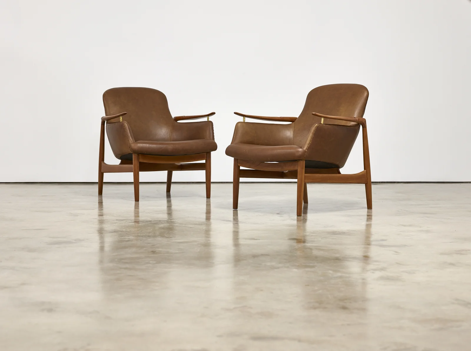 Click here for the 1950s Finn Juhl by Niels Vodder NV53 Armchairs