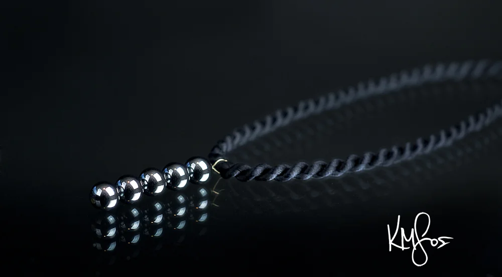 Hematite on Black Silk Cord