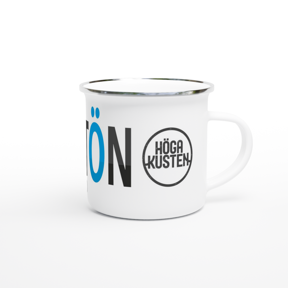 The picture shows a right side view of the 12oz white enamel mug "#MJÄLTÖN Höga Kusten" from the series HIKING #TAGMUG™