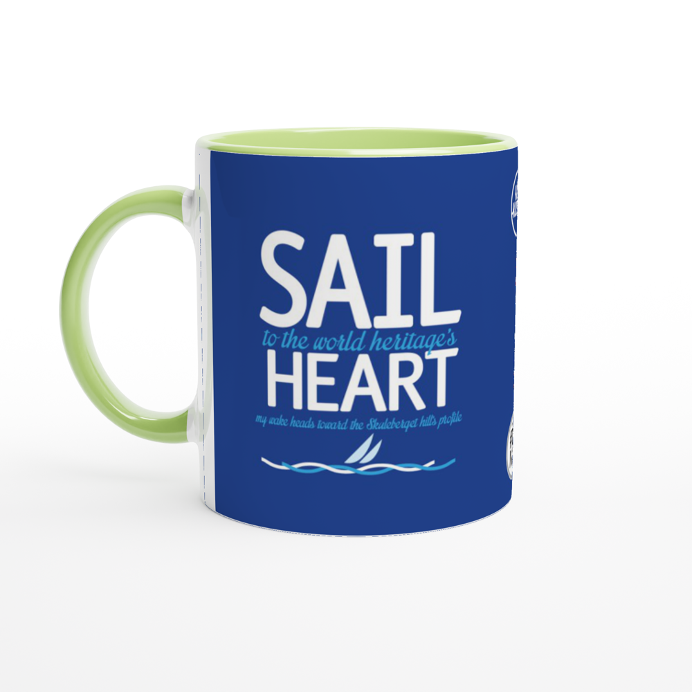 The picture shows a right side view of the 11oz ceramic mug "SAIL TO THE WORLD HERITAGE HEART" from the series HIGH COAST SAILOR #TAGMUG™ with green color inside