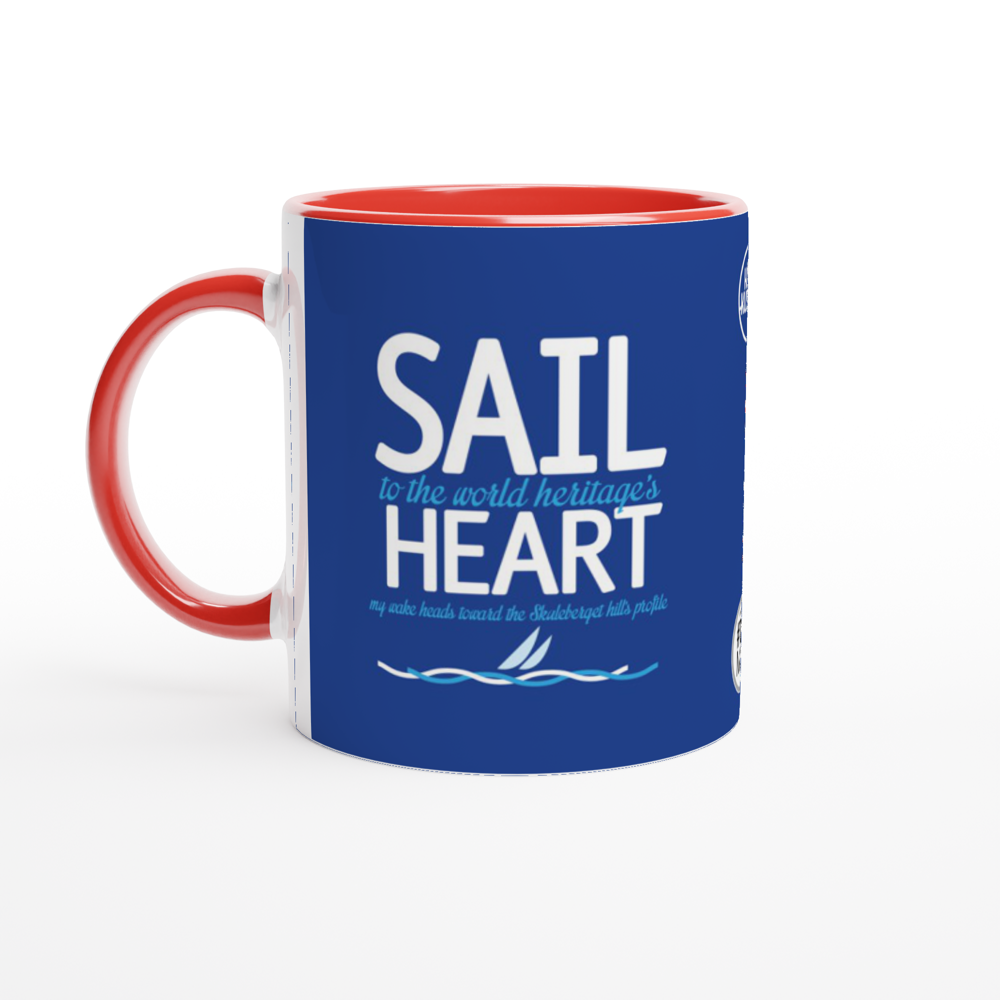 The picture shows a right side view of the 11oz ceramic mug "SAIL TO THE WORLD HERITAGE HEART" from the series HIGH COAST SAILOR #TAGMUG™ with red color inside