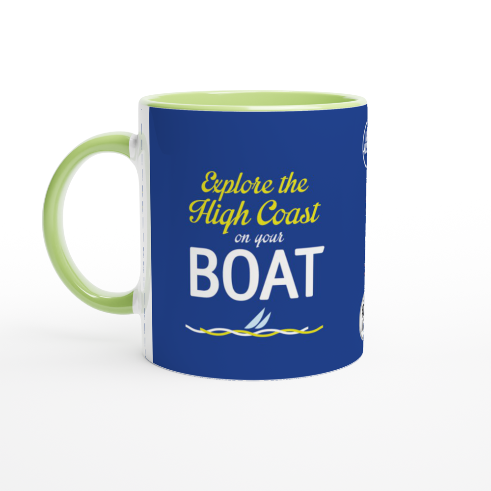 The picture shows a right side view of the 11oz ceramic mug "EXPLORE THE HIGH COAST" from the series HIGH COAST SAILOR #TAGMUG™ with green color inside