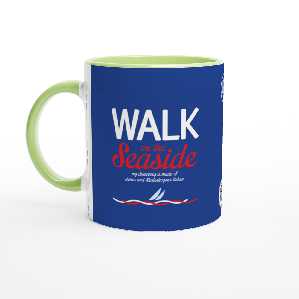 The picture shows a right side view of the 11oz ceramic mug "WALK ON THE SEASIDE" from the series HIGH COAST SAILOR #TAGMUG™ with green color inside
