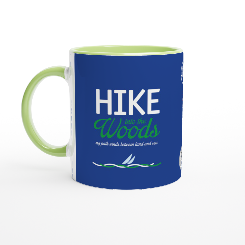 The picture shows a left side view of the 11oz ceramic mug "HIKE INTO THE WOODS" from the series HIGH COAST SAILOR #TAGMUG™ with green color inside