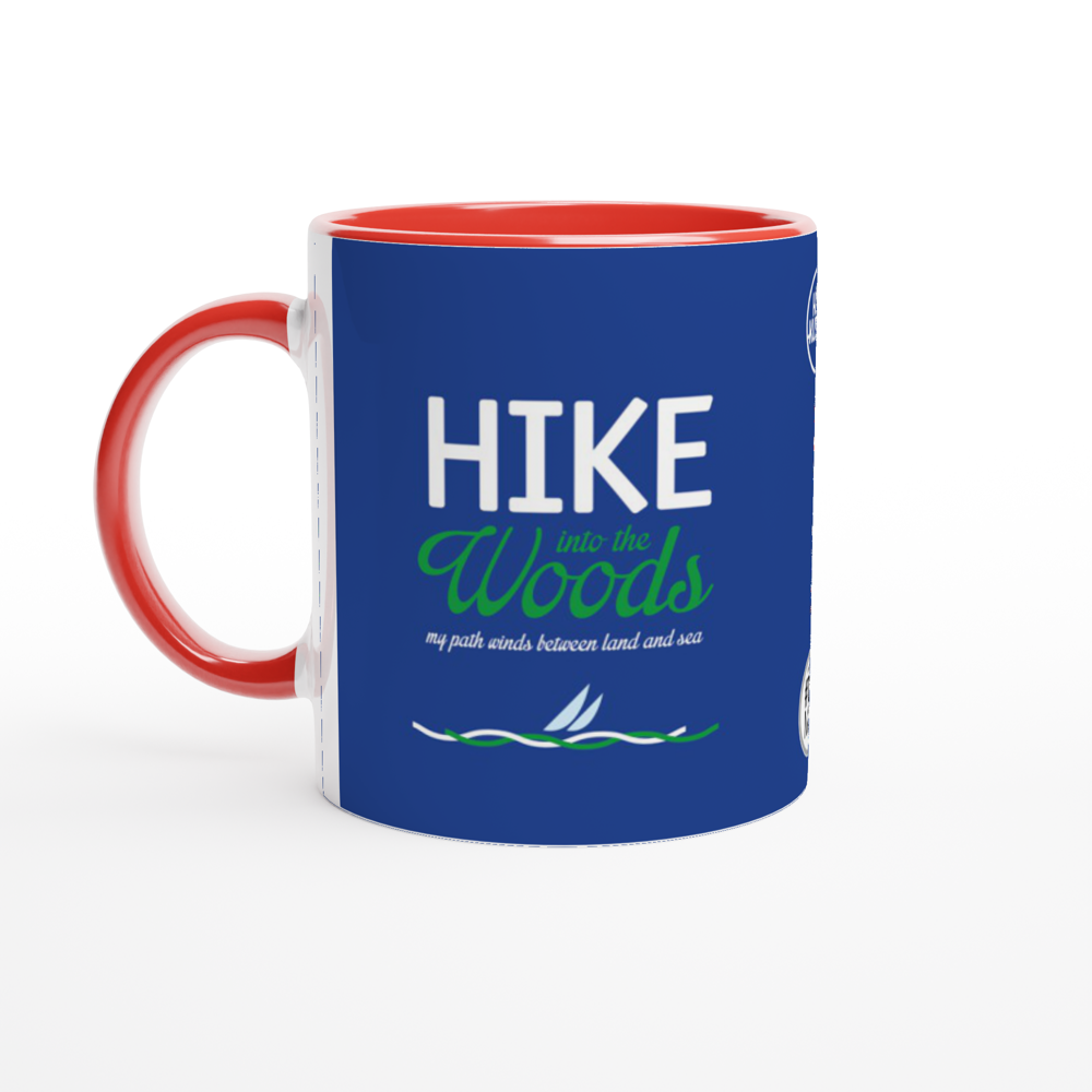 The picture shows a right side view of the 11oz ceramic mug "HIKE INTO THE WOODS" from the series HIGH COAST SAILOR #TAGMUG™ with red color inside