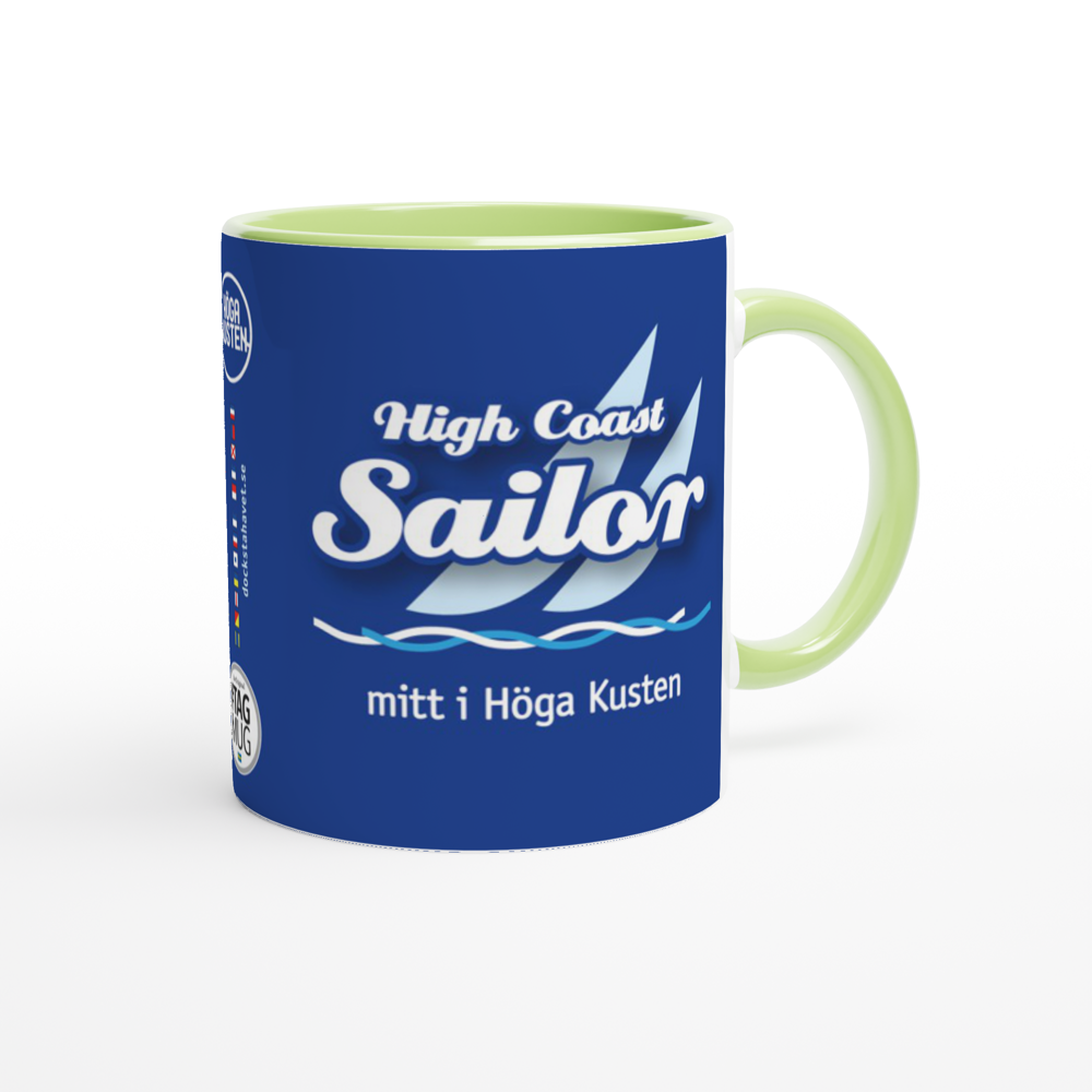The picture shows a right side view of the 11oz ceramic mug "HIKE INTO THE WOODS" from the series HIGH COAST SAILOR #TAGMUG™ with green color inside