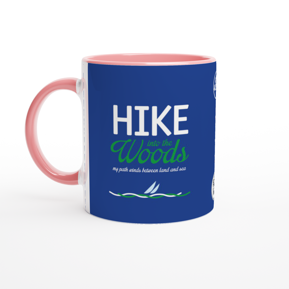The picture shows a right side view of the 11oz ceramic mug "HIKE INTO THE WOODS" from the series HIGH COAST SAILOR #TAGMUG™ with pink color inside