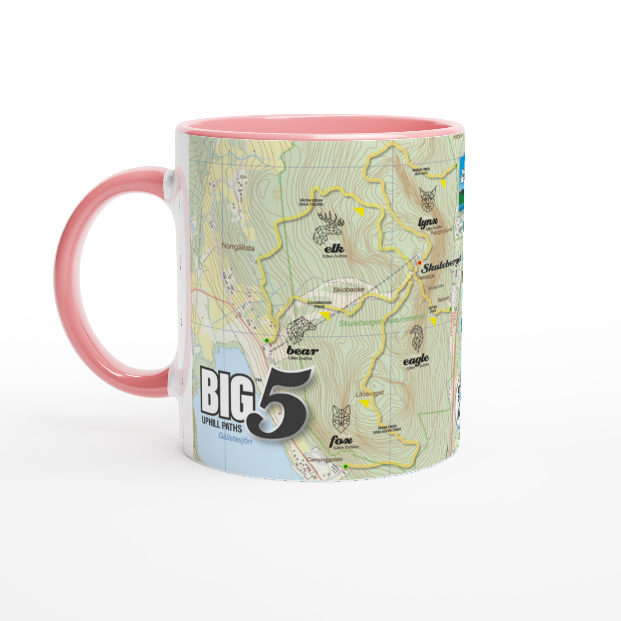 The picture shows a left side view of the 11oz ceramic mug "SKULEBERGET FOX PATH" from the series “SKULE BIG5" #TAGMUG™ with pink color inside