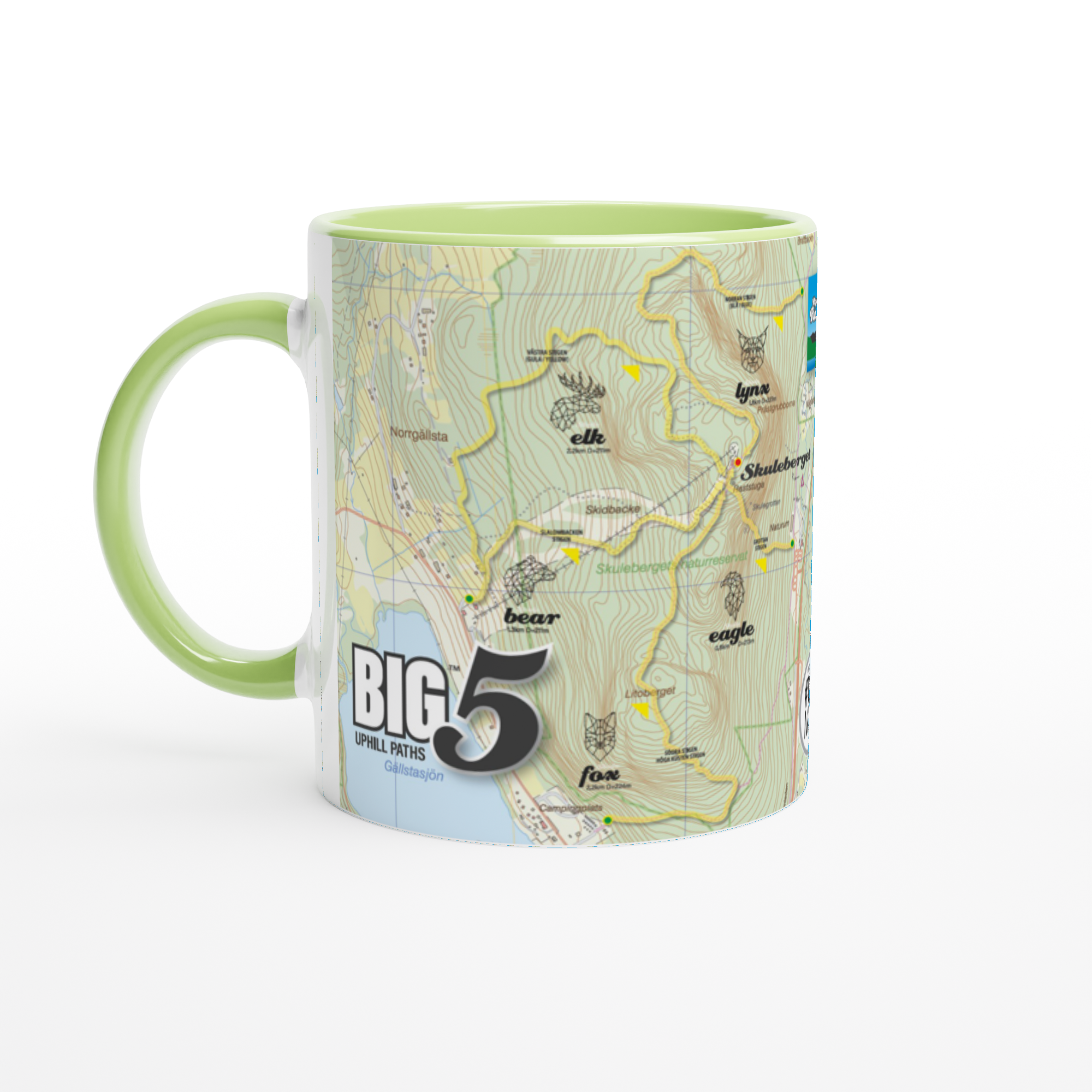 The picture shows a right side view of the 11oz ceramic mug "SKULEBERGET FOX PATH" from the series “SKULE BIG5" #TAGMUG™ with green color inside