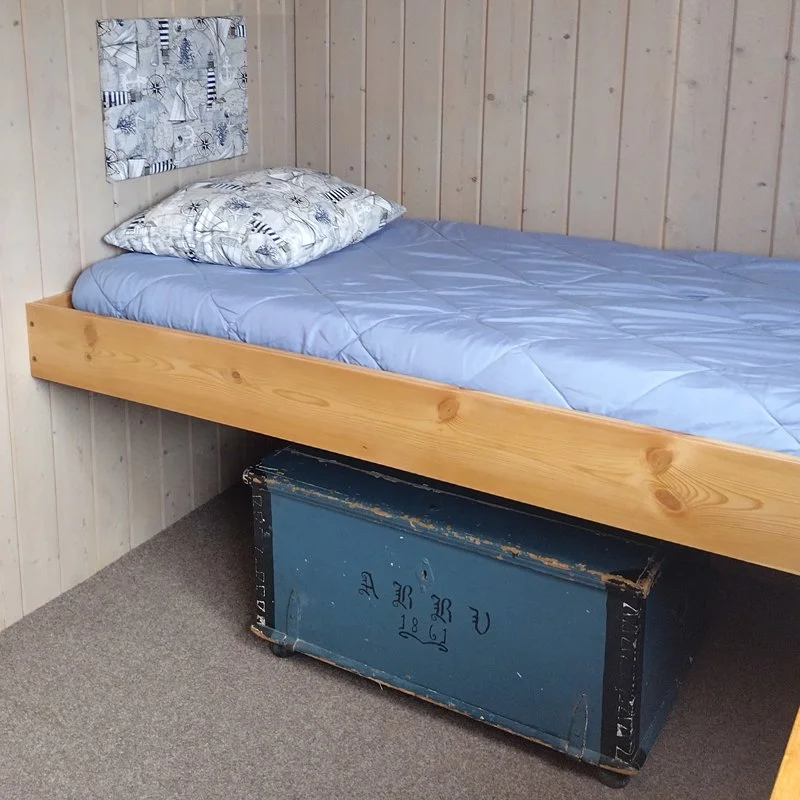 airbnb-captain-cabin-single-bed-curated-nautical-style-interiors-high-coast-base-camp-docksta-havet-workation-lodging.jpg