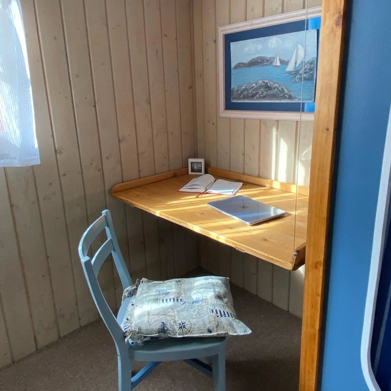 curated-single-cabin-interiors-nautical-design-desk-work-drawers-interiors-airbnb-hoga-kusten-base-camp-docksta-havet-workation.jpg
