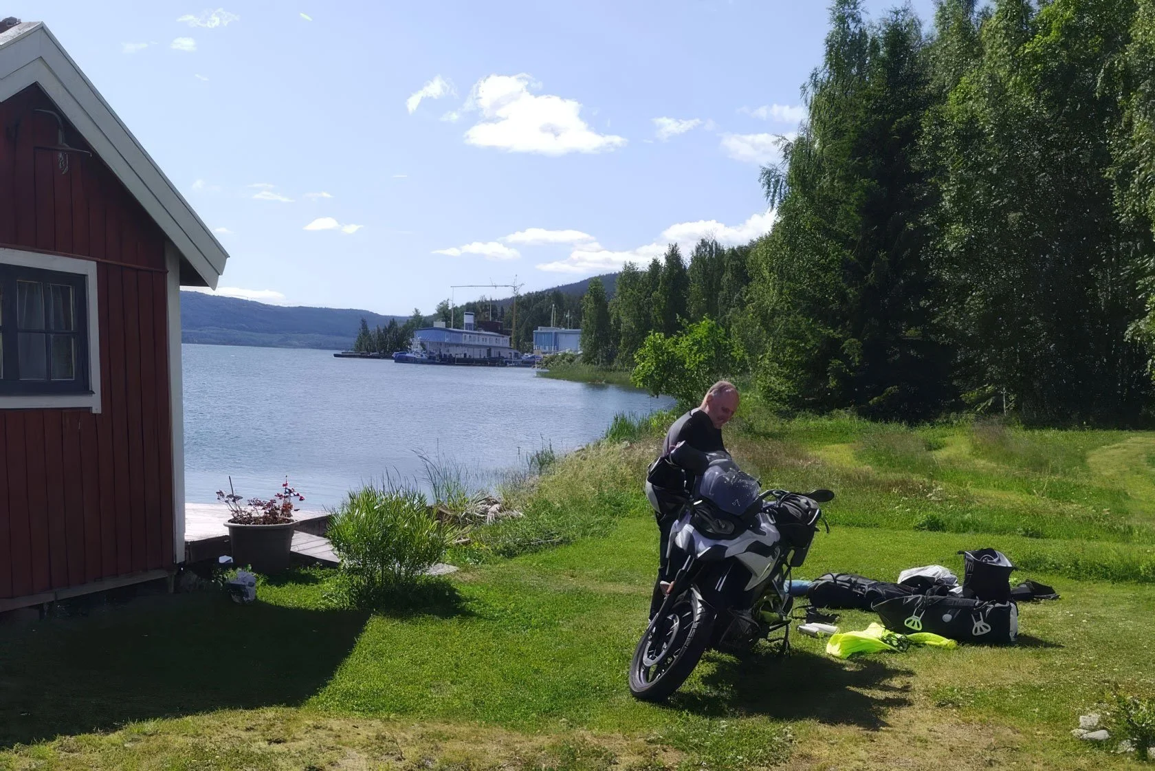 E4 motorbike stopover in Docksta, High Coast (Höga Kusten): safe parking, hot shower, flexible check-in for riders heading north or south.