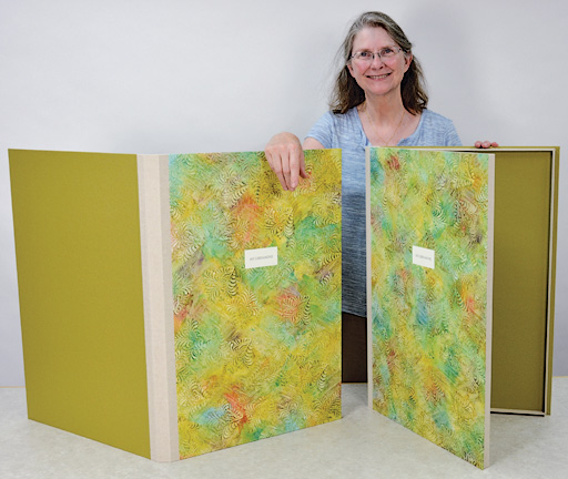 Jill with the 2 clamshells. Each will house 20 of MaryFran's prints.