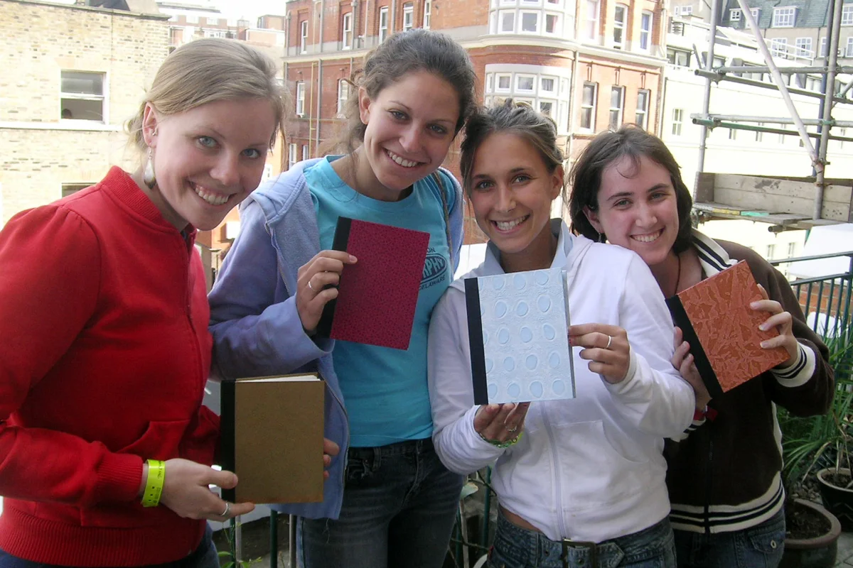 The 4 students and their final pieces at the end of the bookmaking workshop.