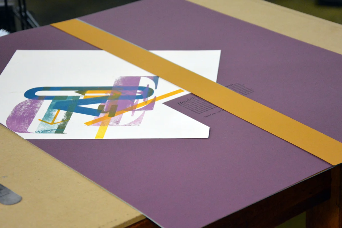 Trimming the Canson paper to size gave everyone some colorful strips to use as additional design elements to help connect their set of posters.