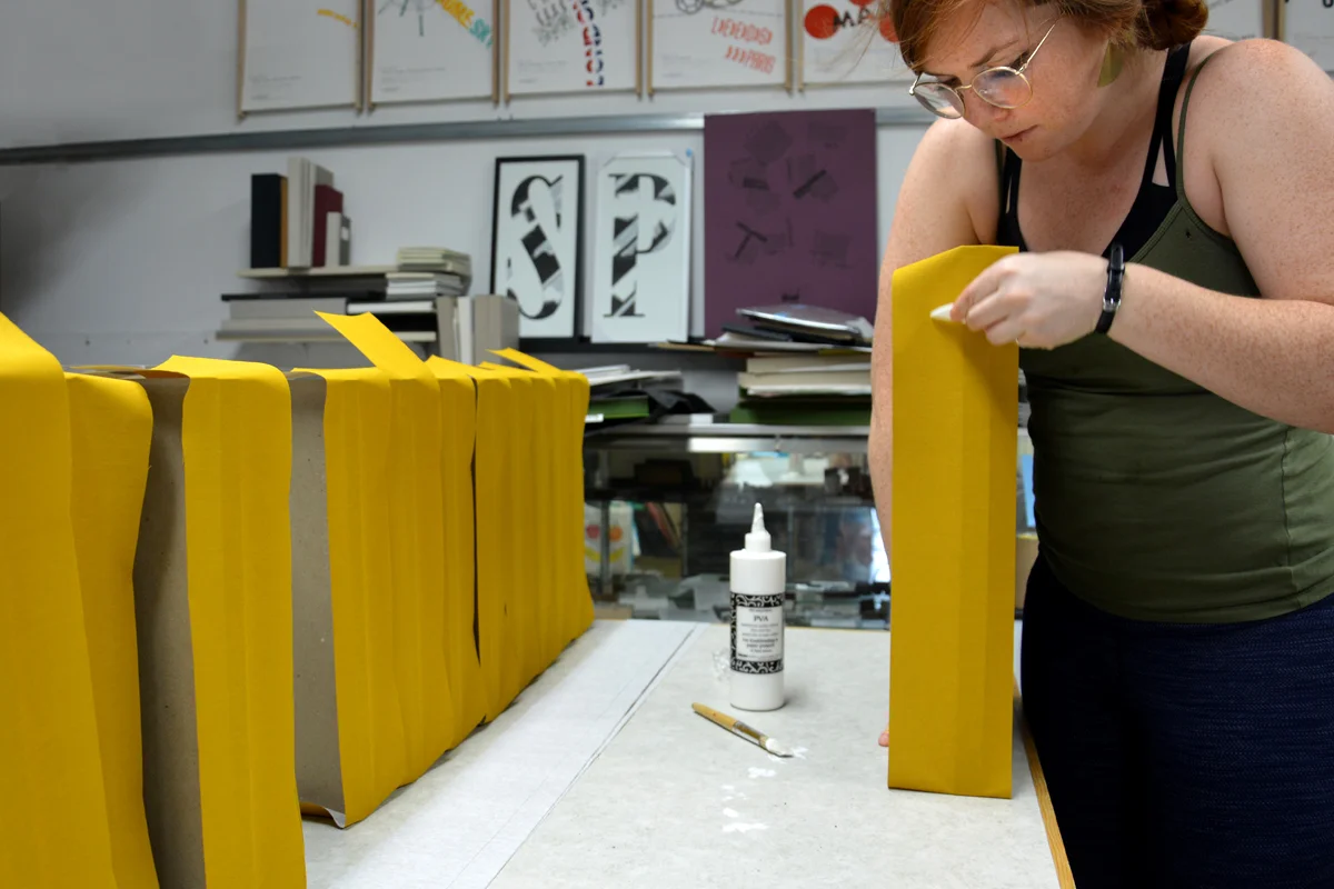 180823-lindsay-working-on-clamshells-04.jpg