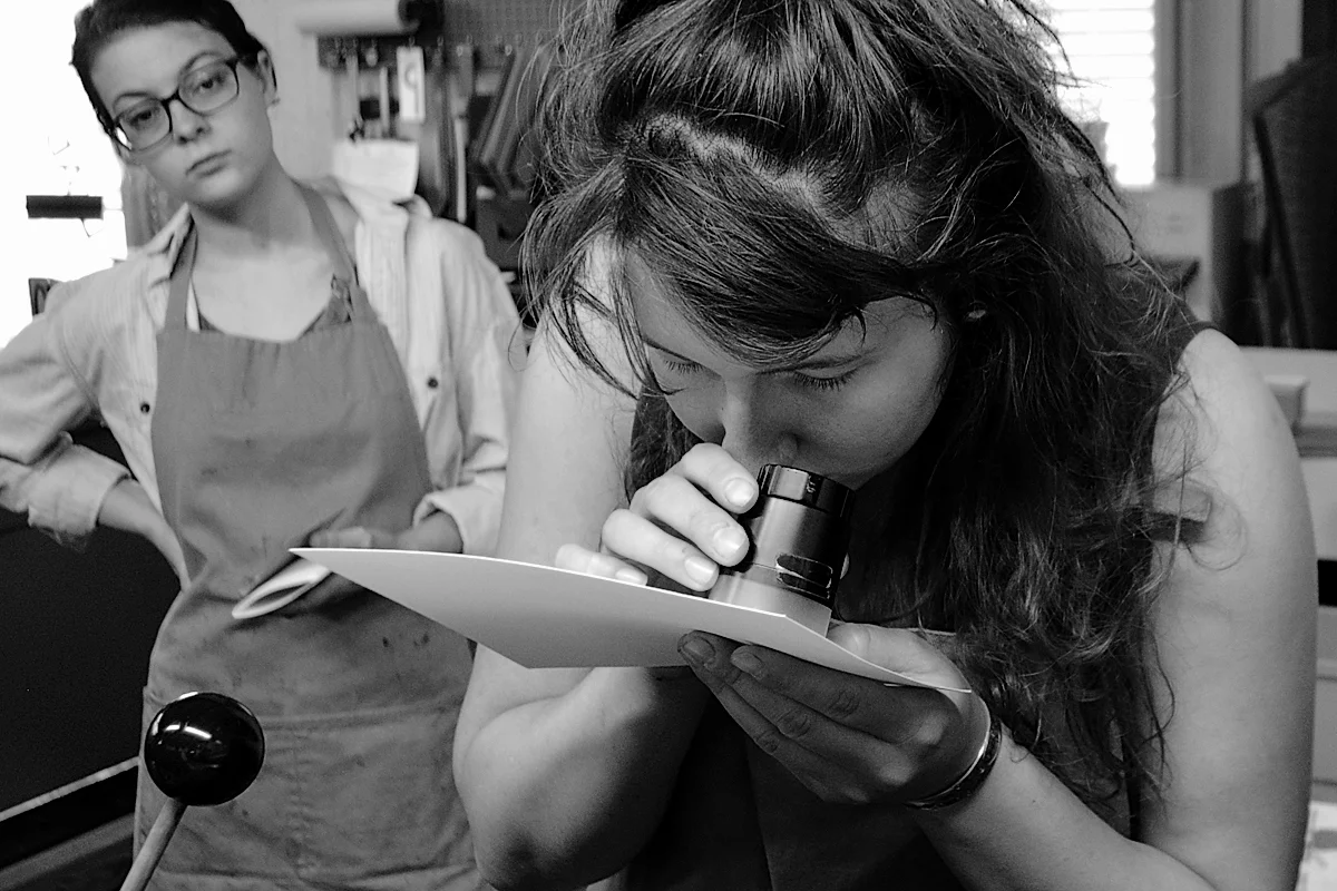 Checking the impression depth and inking quality through an 8x loupe