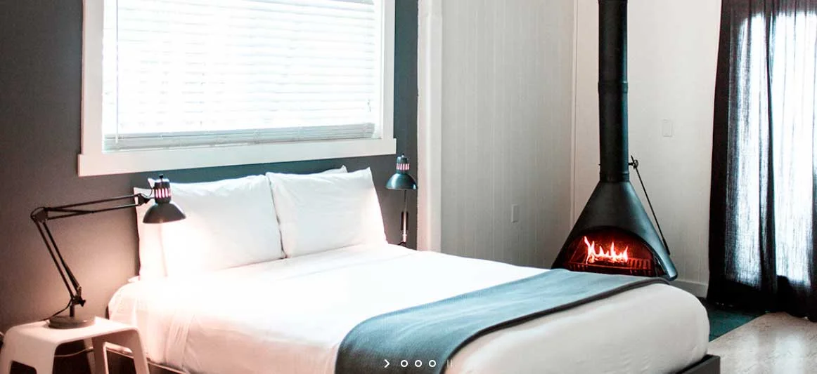 Keeping the environment in mind, the rooms are uncluttered, open and calming, with bamboo flooring, a small fireplace and big beds. Source: boonhotels.com