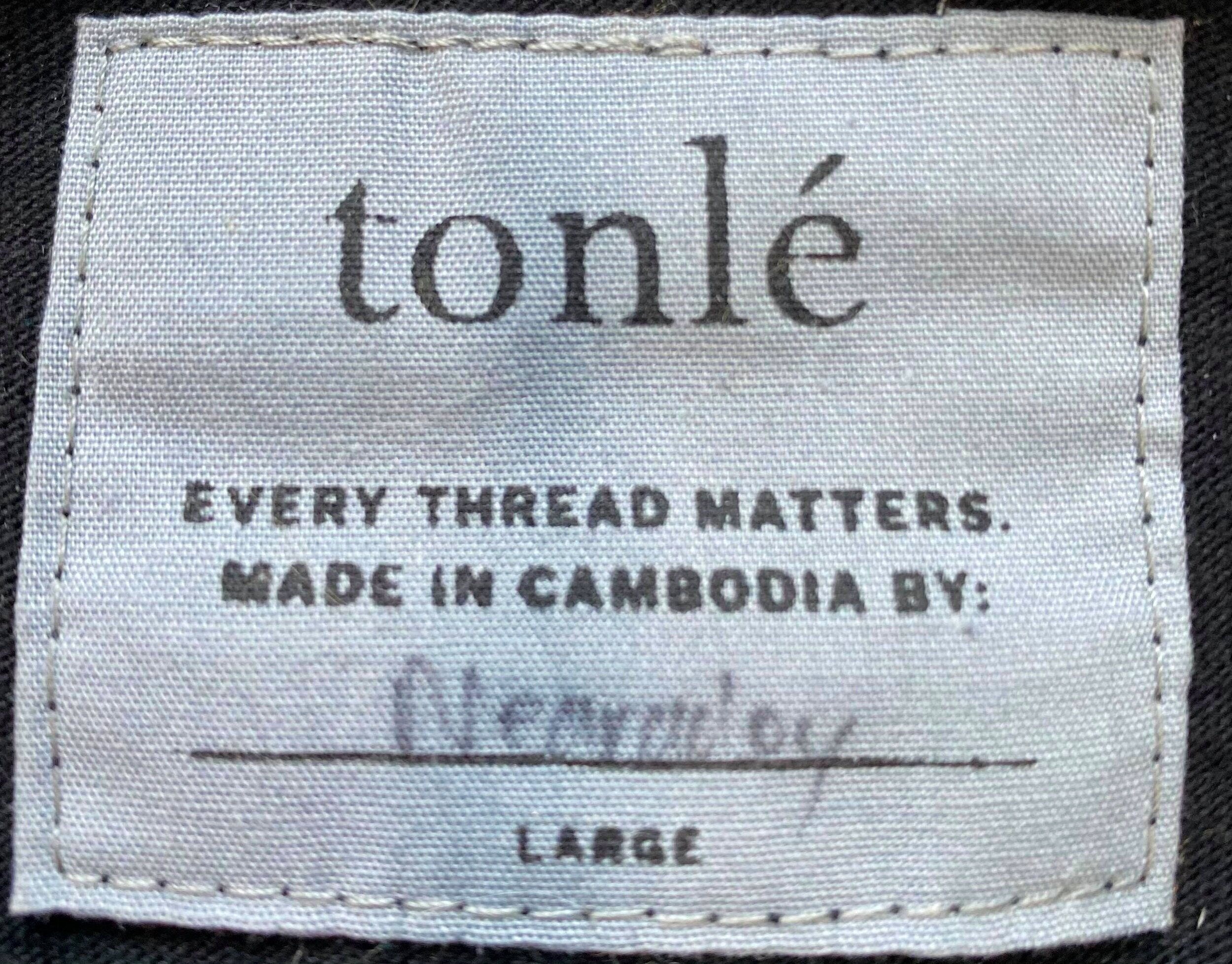 “Who made your clothes?”  A unique collection of clothing tags featuring the names of those who crafted the garment