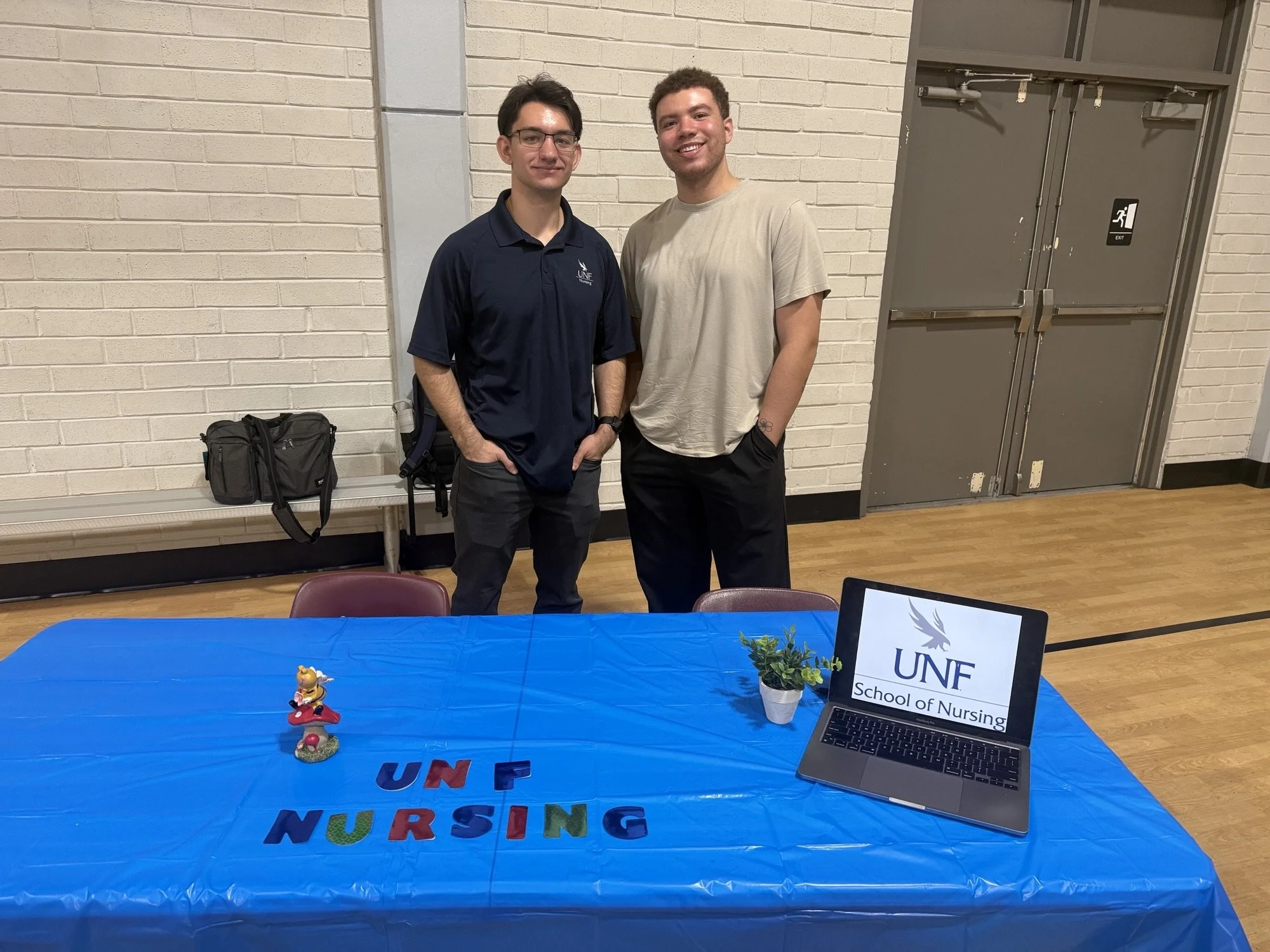 University of North Florida explaining nursing as a career path to high school students at the Mali Vai Youth Foundation