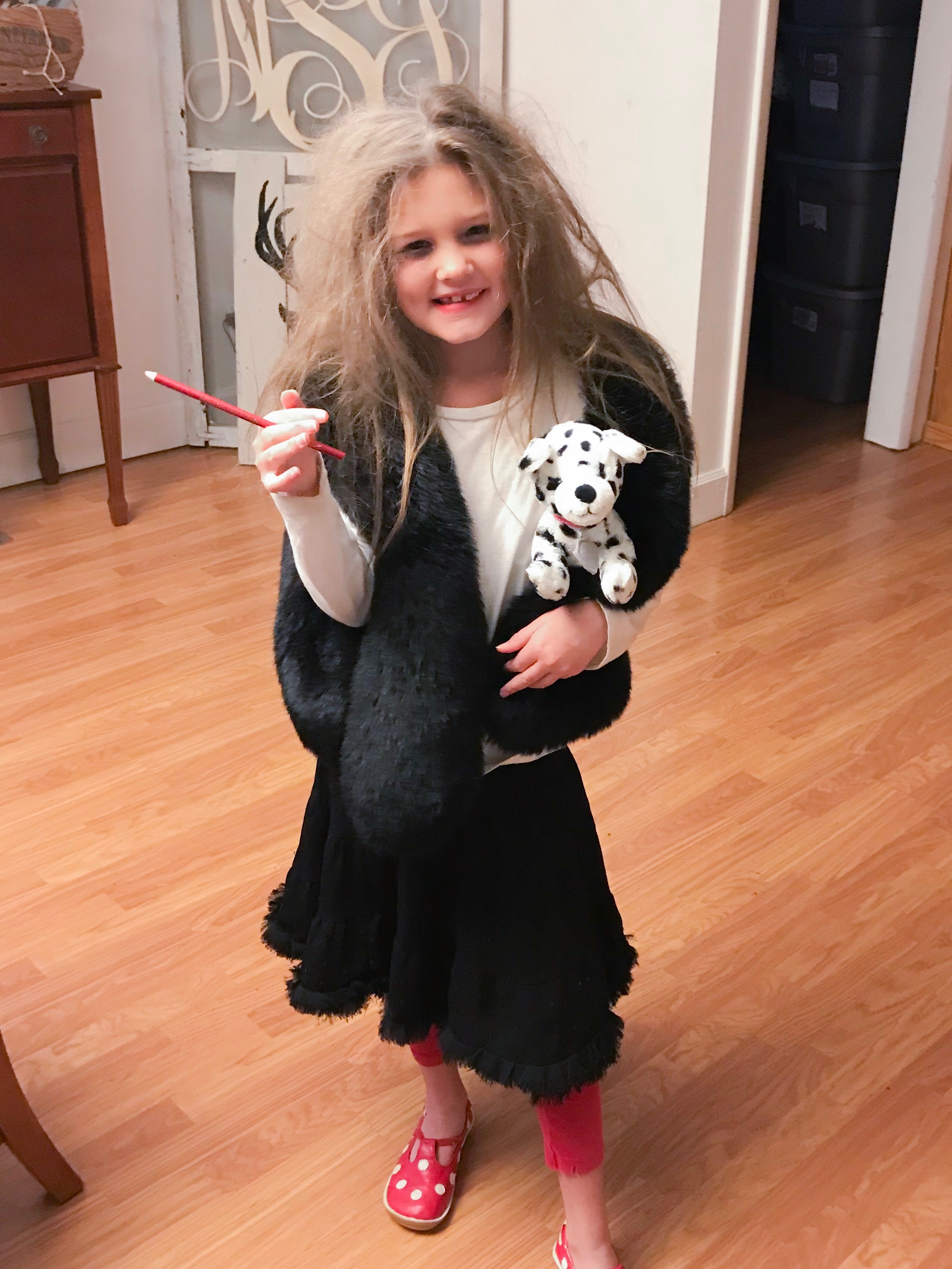 101 Dalmatian theme for their 100th day of school......this is what she looked when she left the house that morning.