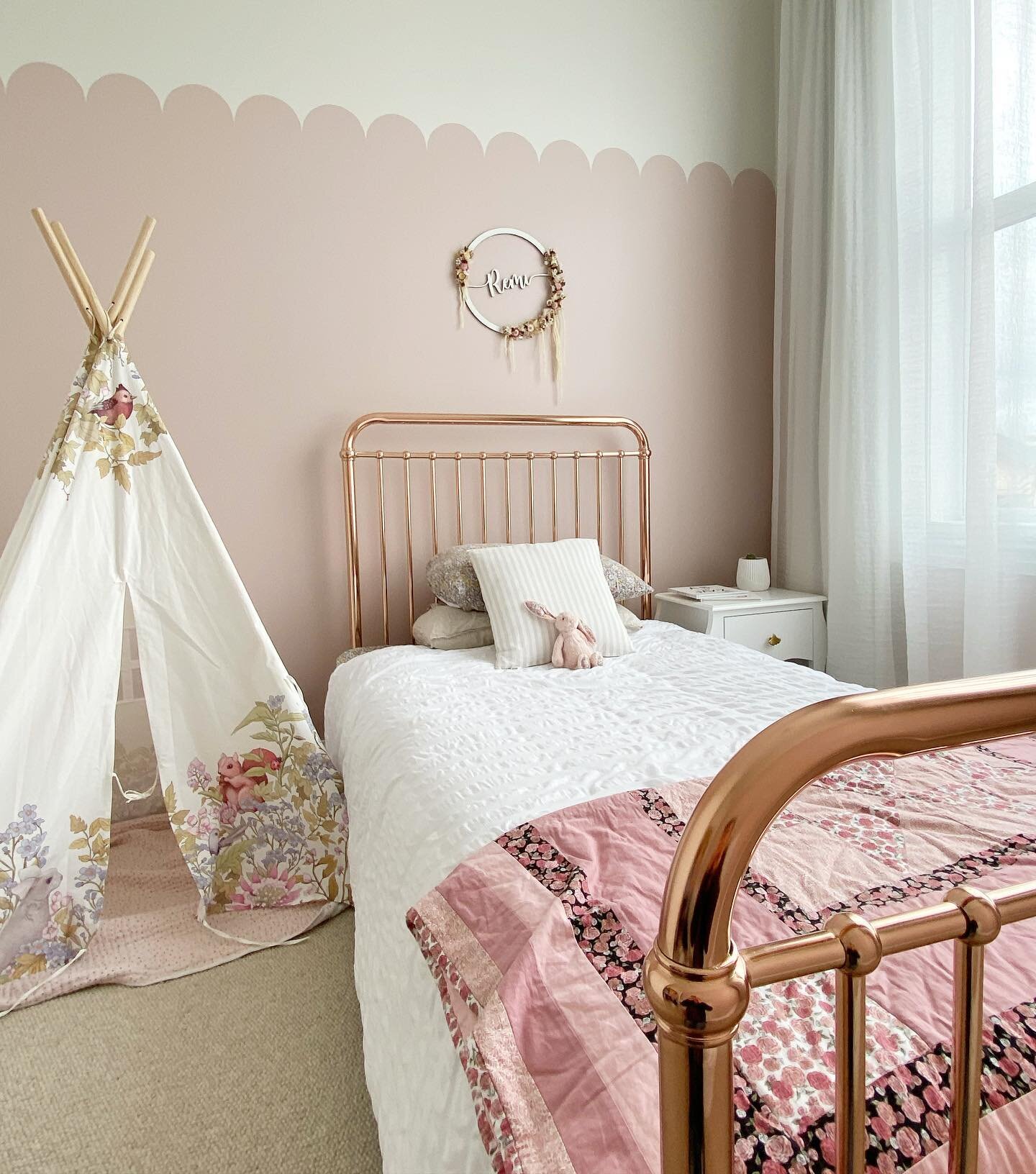 Pretty in pink 💖 A room fit for a little princess that was just so much fun to design. This rose gold bed from @incyinteriors is the icing on the cake. 

I love the arch detailing that we ran 2/3 of the way up the wall - same height at the tiles in 