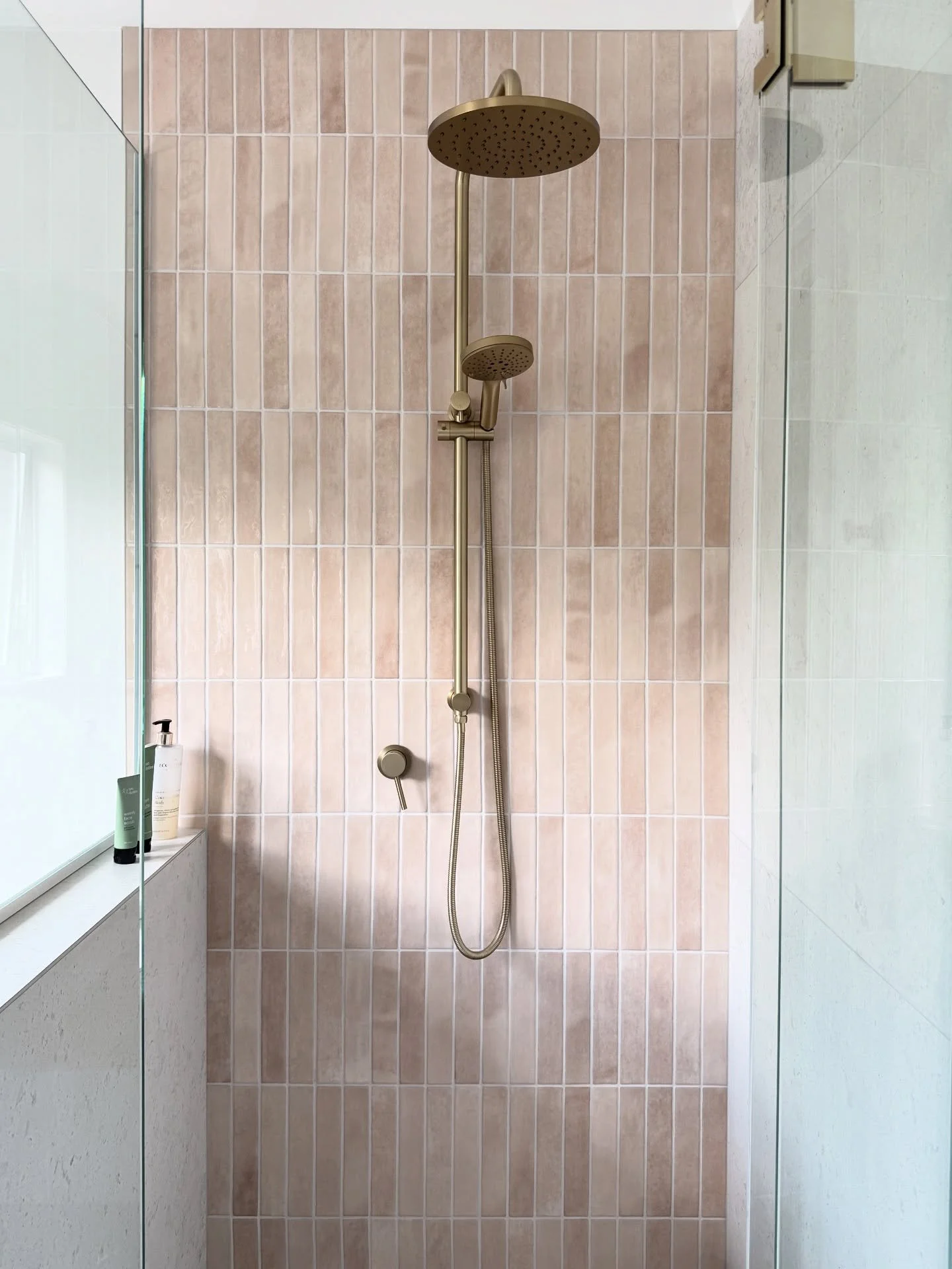 This shower was super cramped at only 900 x 900 with the corner cut off&hellip; Not to mention the leaking 🫣 We not only enlarged it but added the nib wall to bring privacy to the toilet. Twofold the ledge provides a handy storage shelf which allowe